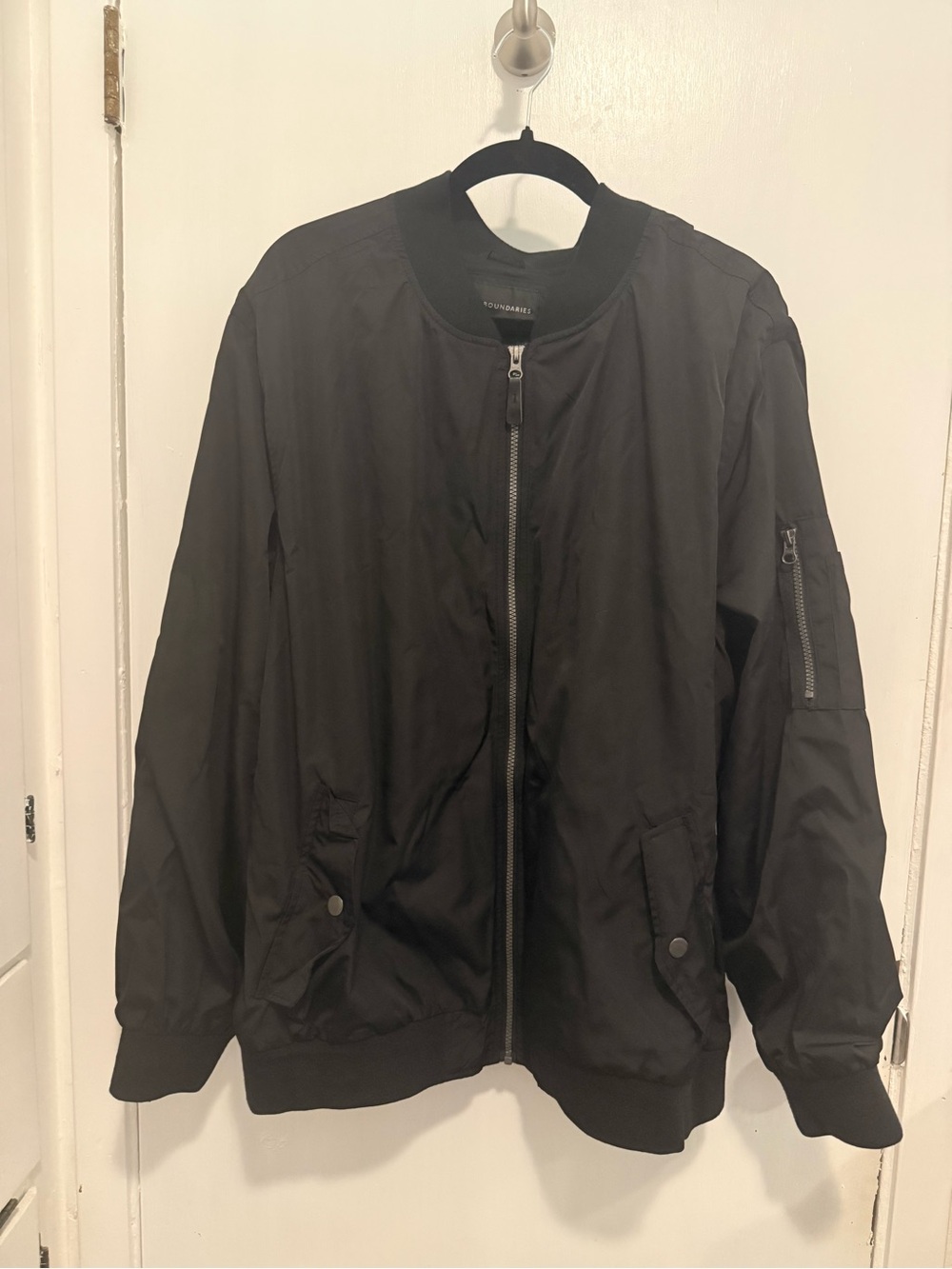 New: men’s No Boundaries bomber jacket; black size 2XL